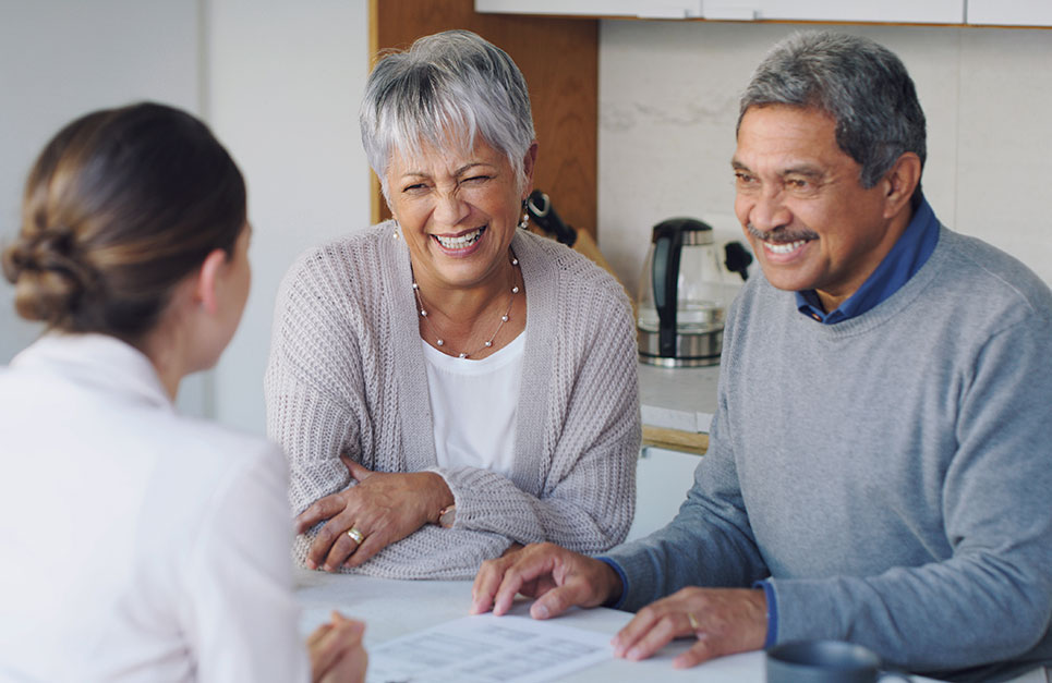 Caregiver talking with clients